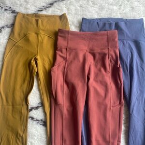 3 pairs of lululemon leggings size 2,4 slate blue, terracotta and turmeric